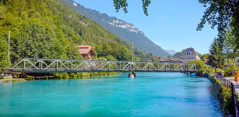 Aare River in Interlaken is neon light blue in this virtual citywalks