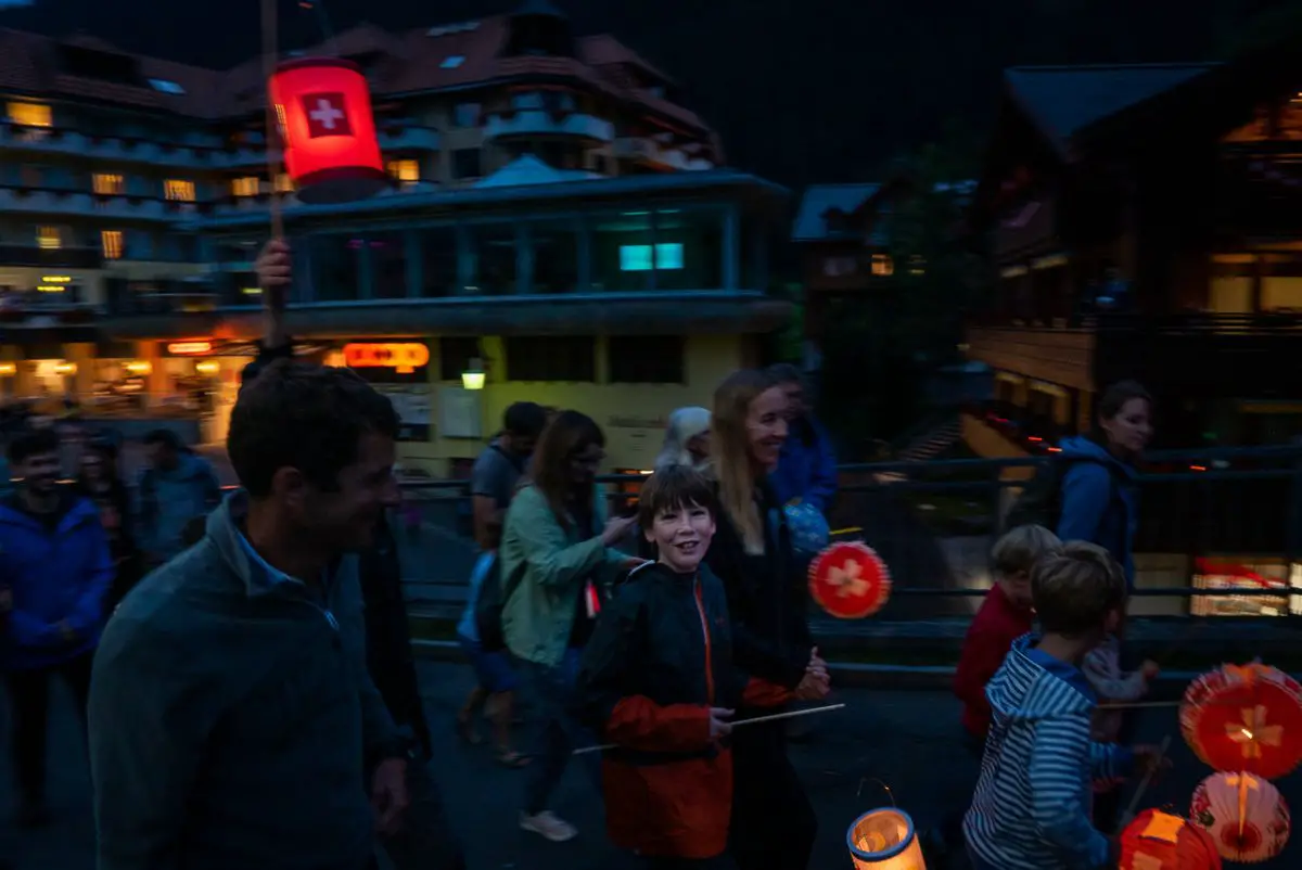 Children parading in Wengen Switzerland with lanterns