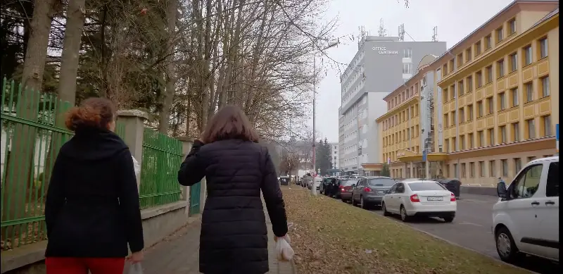 Two Women walking the streets of Banská Bystrica, Slovakia in winter