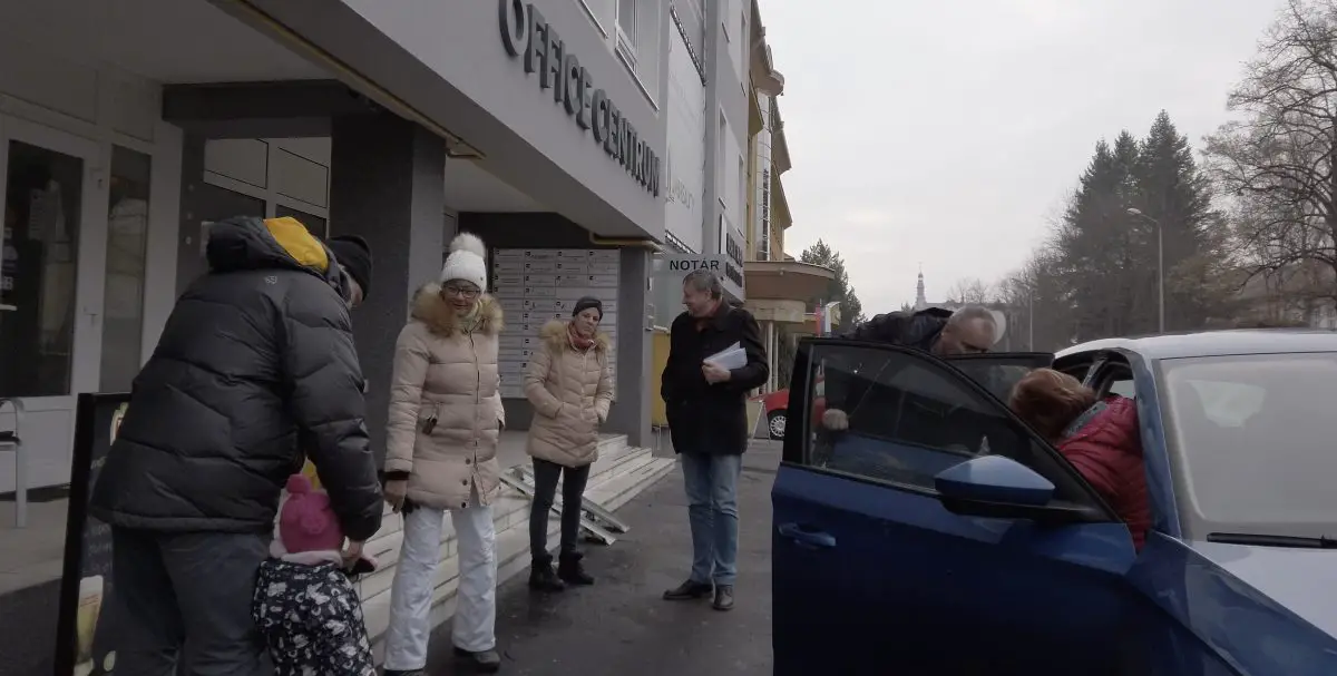 Citizens look at young child in Banska Bystrica Slovakia