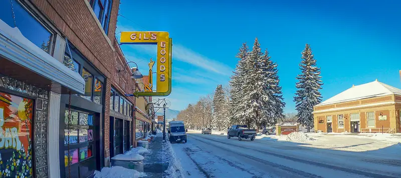 Gils Goods Sign on Park Street on subzero day in Livingston, Montana during citywalk live