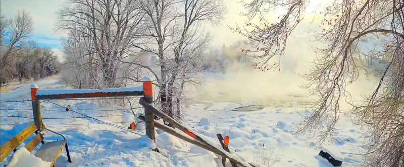 Steam and frost along Yellowstone river on subzero day in Montana during virtual walking tour