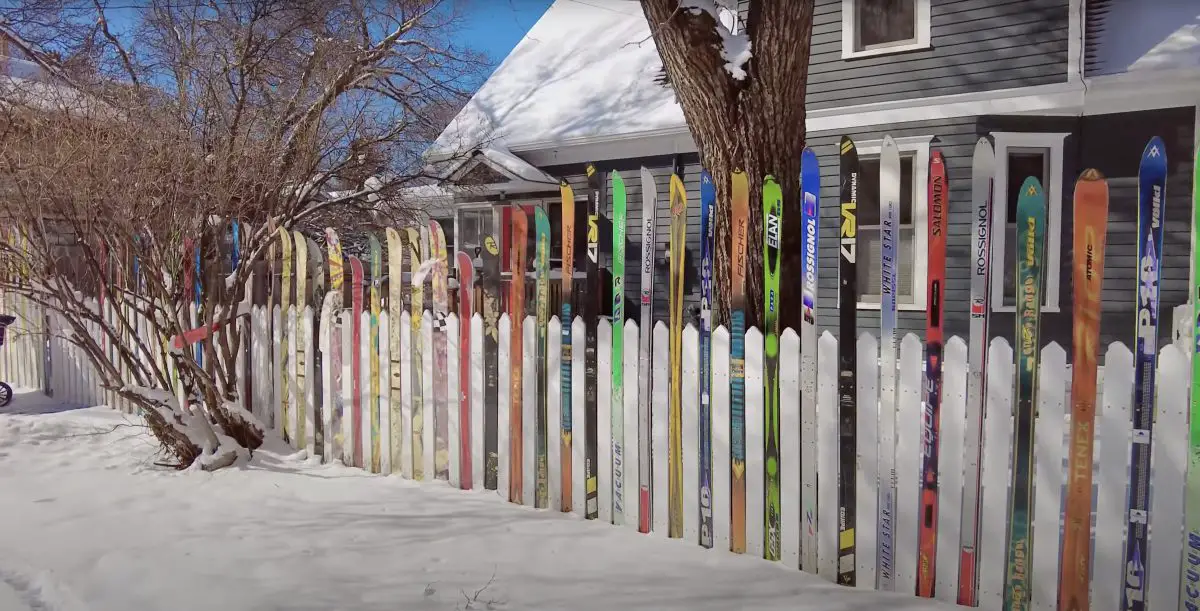 fence made of skis on snowy day in Bozeman Montana