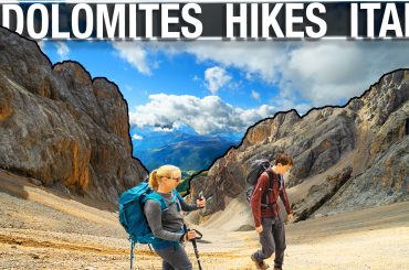 Couple hiking in the Italian Alps of Dolomites for scenery