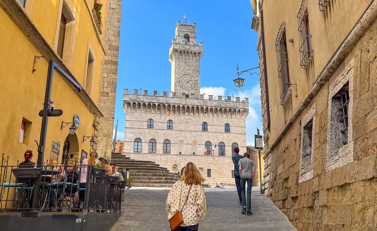 View of the city building with bell tower in Montepulciano, Italy