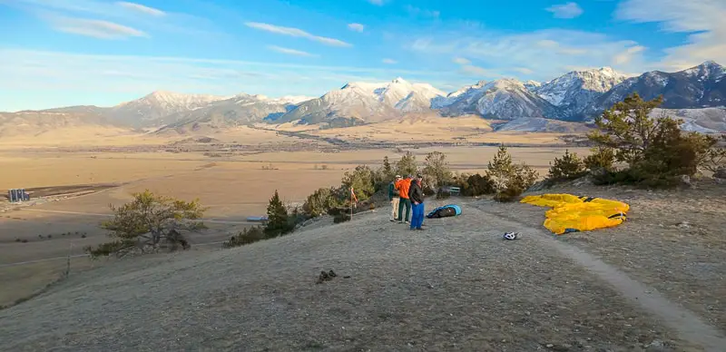 Paraglider setting up on hogback trail as seen on our virtual walking tour