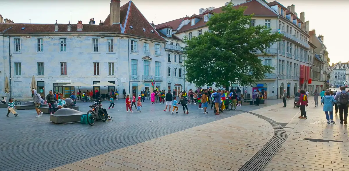 Families enjoying a summer evening in Besancon, France during our virtual walking tour