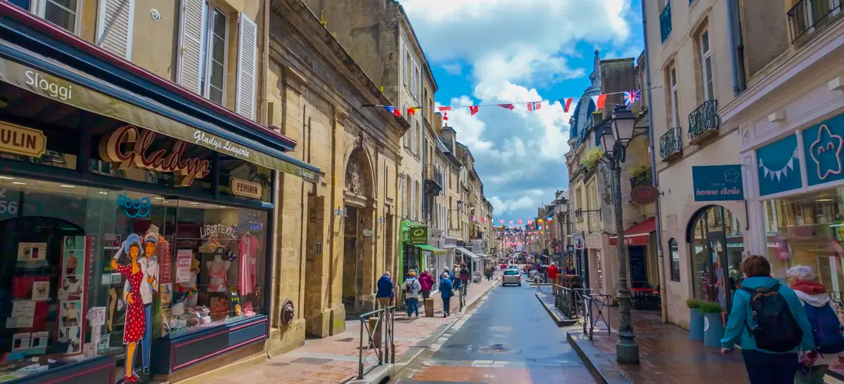 Flags and decorations in Bayeux France to commemorate the Normandy invasion as seen on our city walk live on site