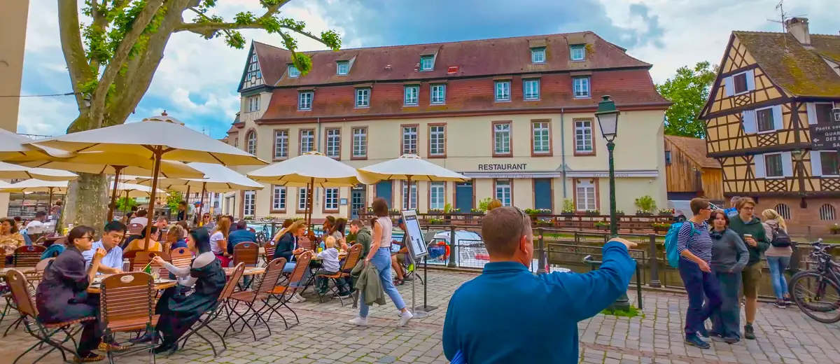 Cafe along the canals of Strasbourg, France during a virtual city walk