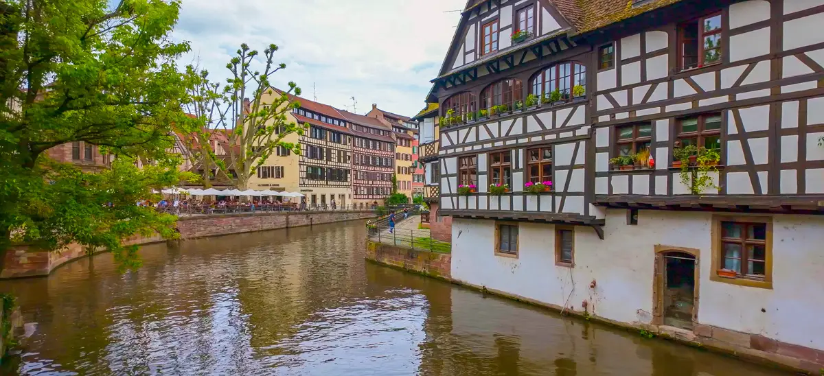 Medieval Houses along a canal in Strasbourg during our virtual city tour for treadmill